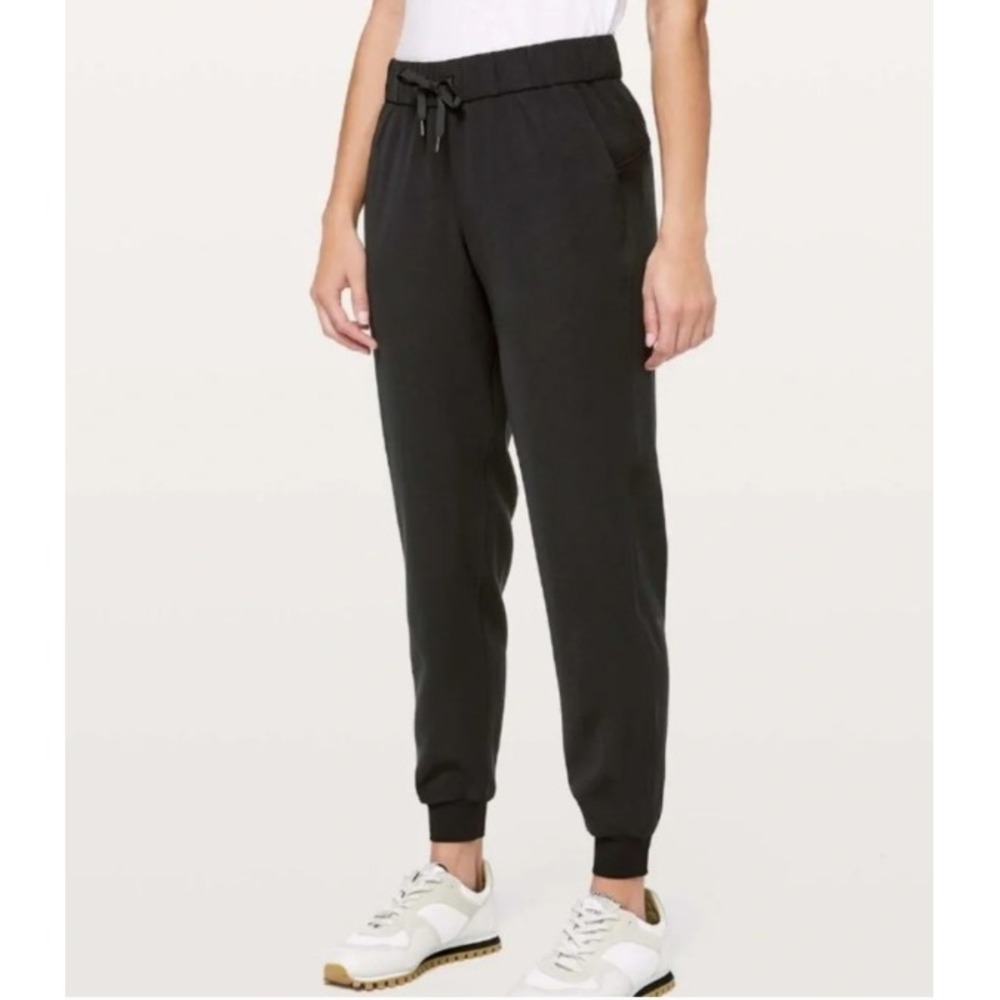 Lululemon On the Fly Luxtreme Jogger Pants Women 10 Black Travel Loungewear Yoga